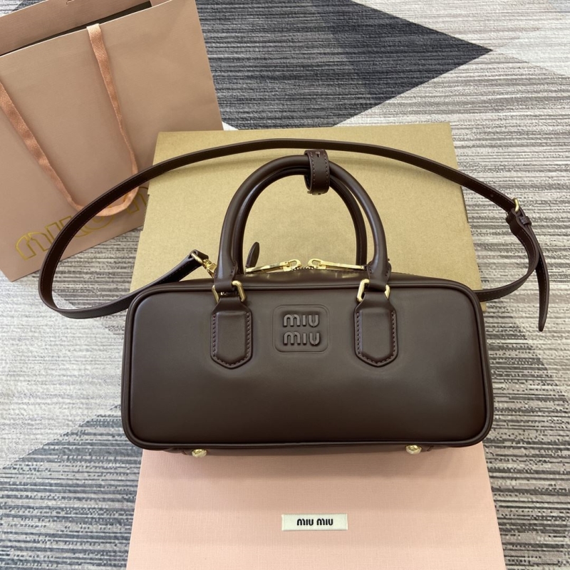 G*u*i top handle bags